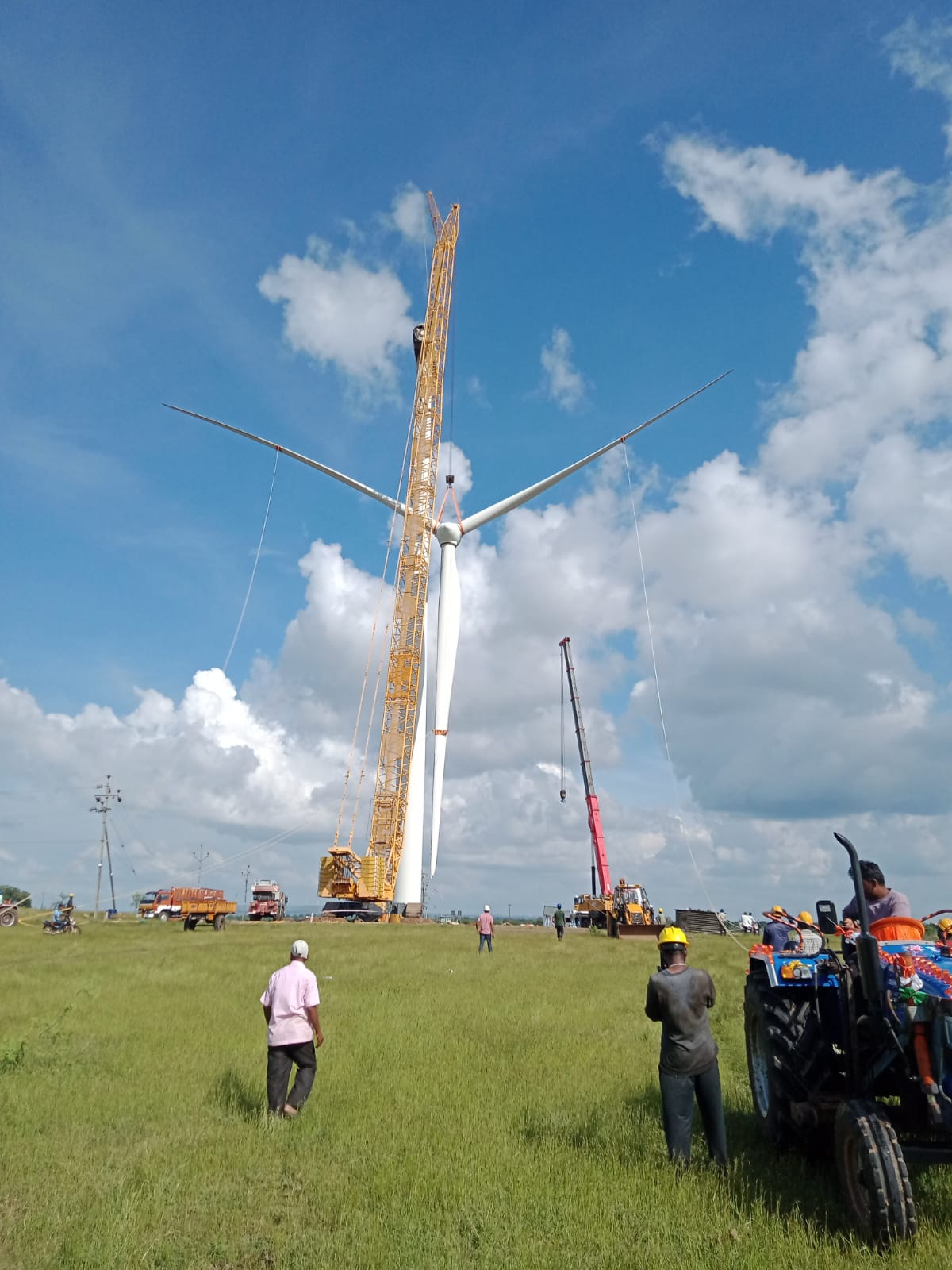 Wind turbines in a green field